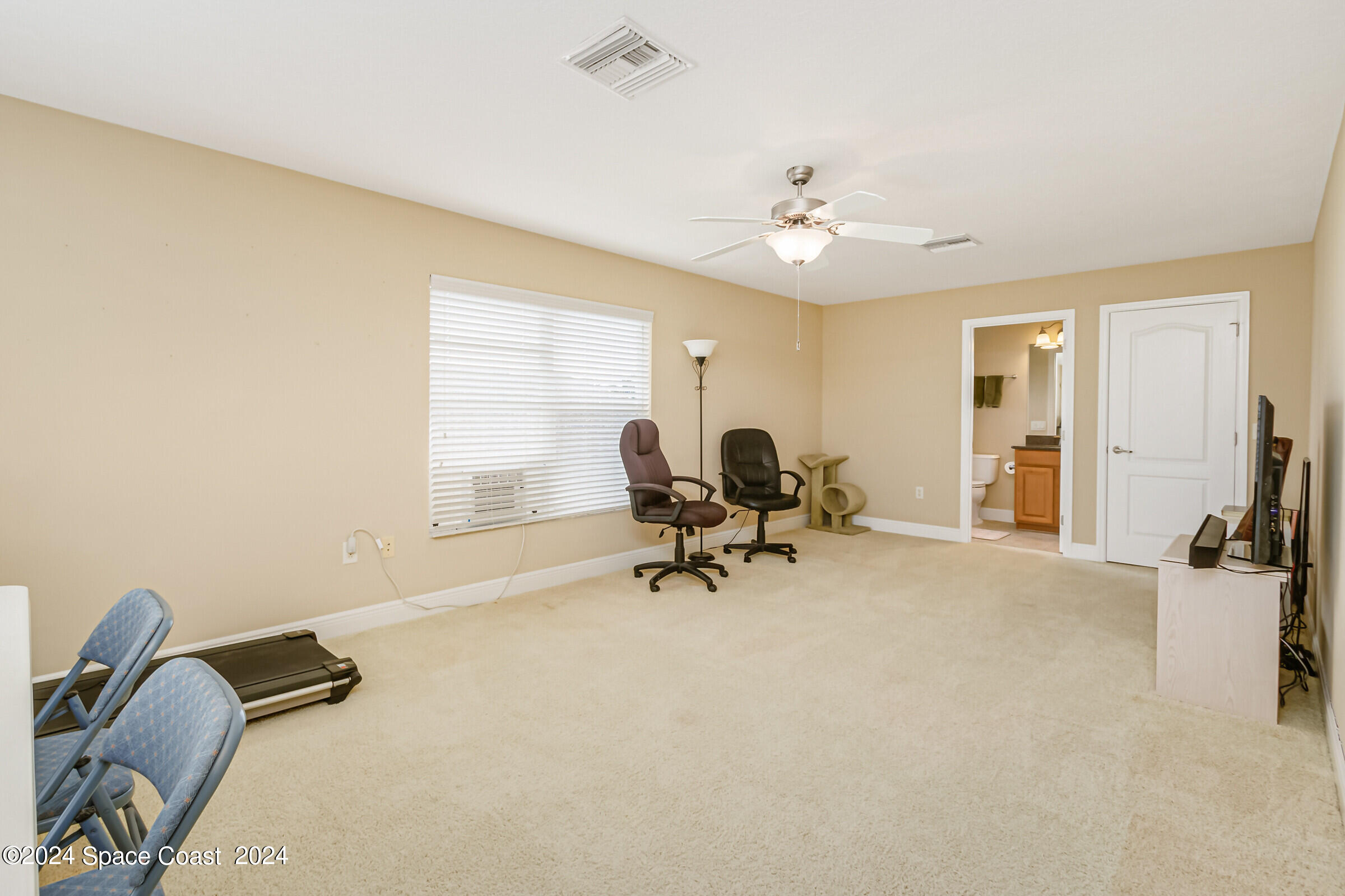 5972 Goleta Circle Melbourne, FL 32940 - Photo 46 of 56 a view of a workspace with furniture and a window