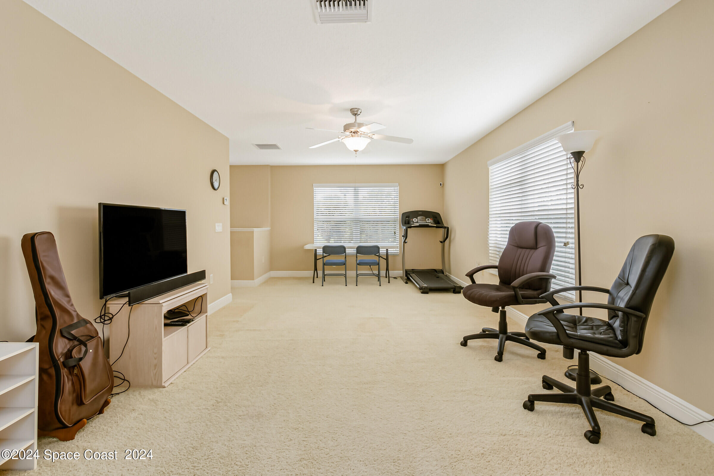 5972 Goleta Circle Melbourne, FL 32940 - Photo 47 of 56 a view of a livingroom with workspace and a window