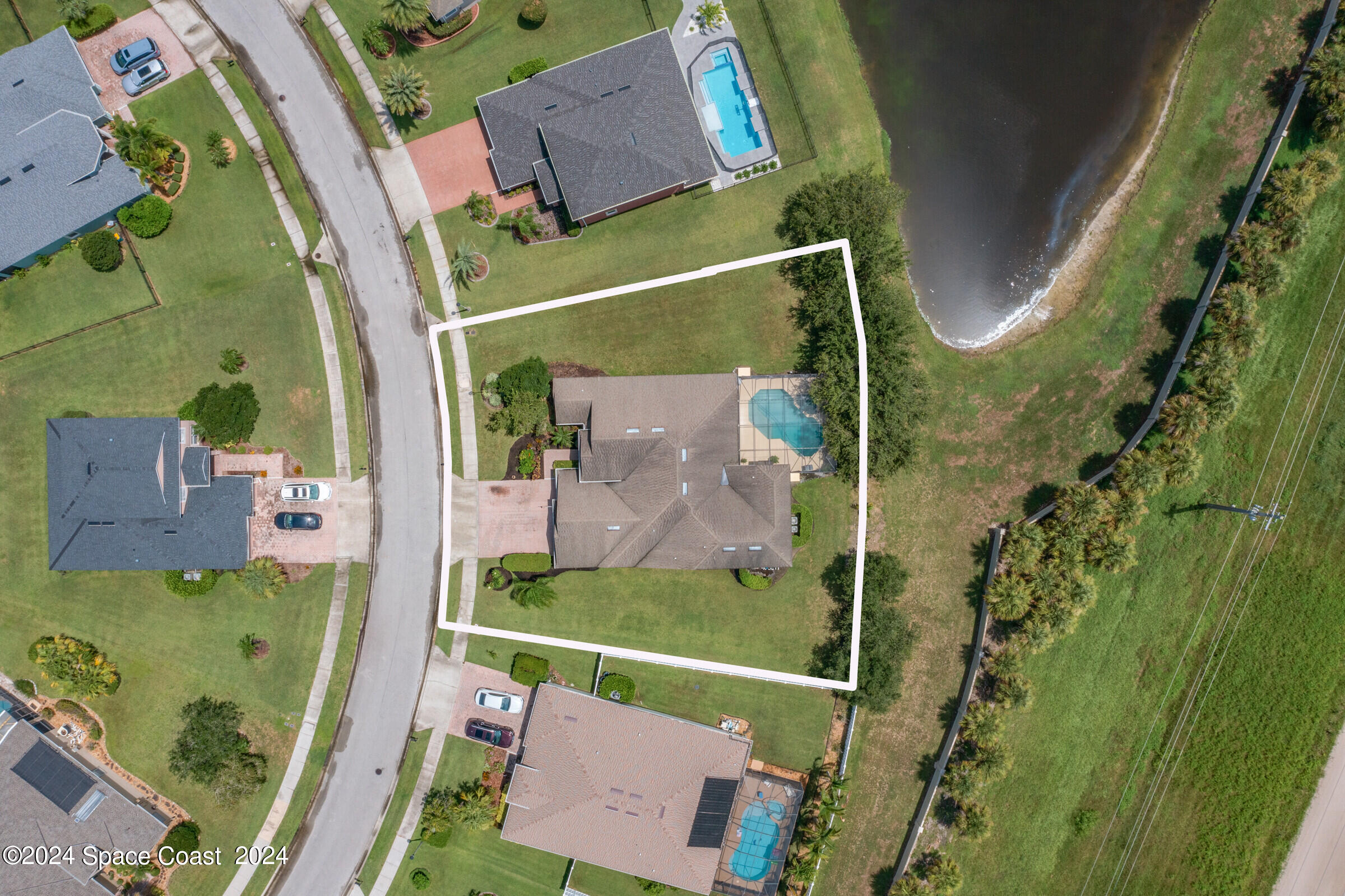 5972 Goleta Circle Melbourne, FL 32940 - Photo 52 of 56 an aerial view of residential house with outdoor space and swimming pool