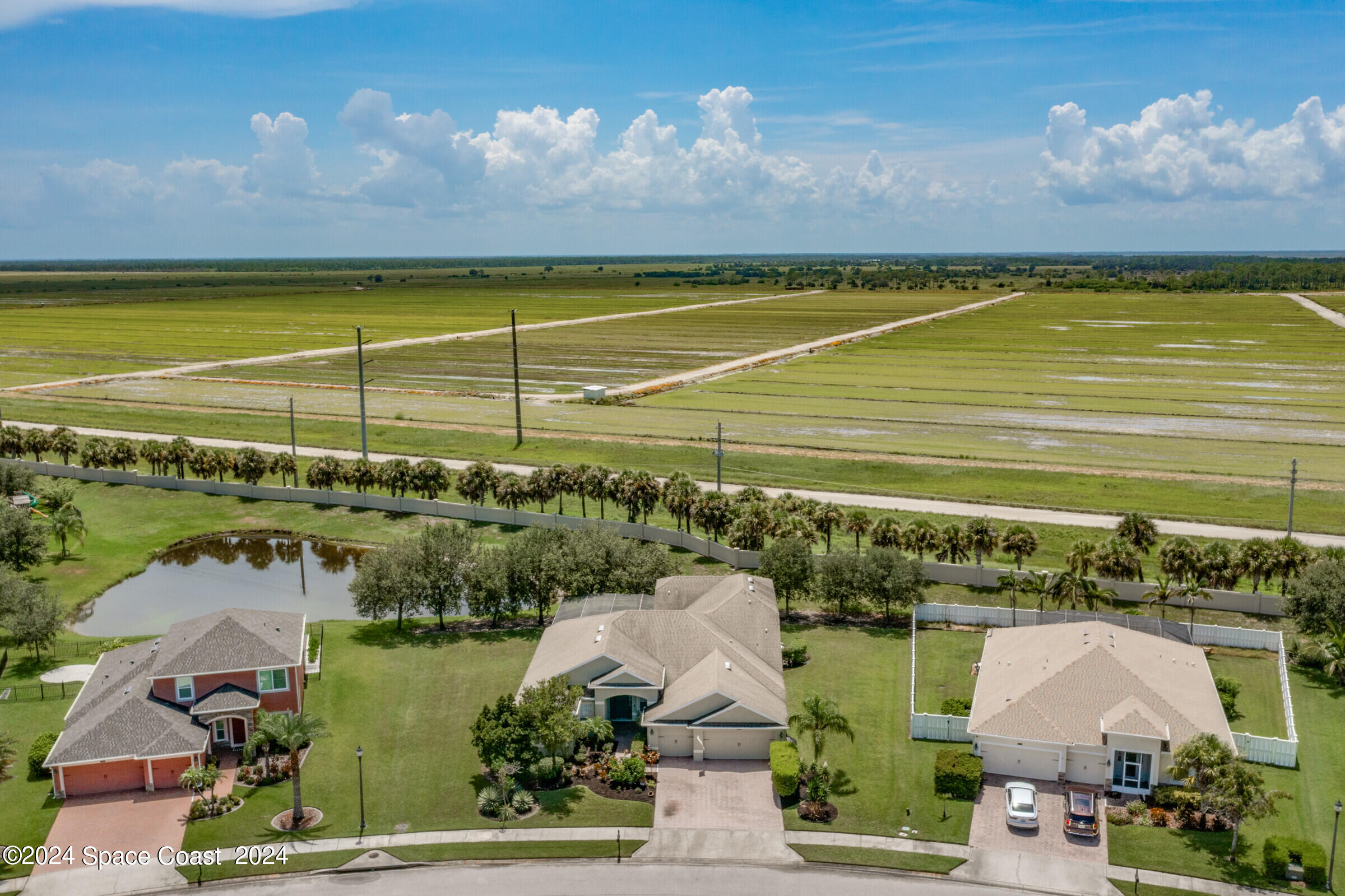 5972 Goleta Circle Melbourne, FL 32940 - Photo 54 of 56 a view of a swimming pool with an outdoor space and seating area