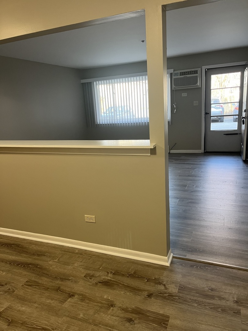 8817 South Roberts Road, Unit 5 Hickory Hills, IL 60457 - Photo 3 of 6 a view of empty room with window