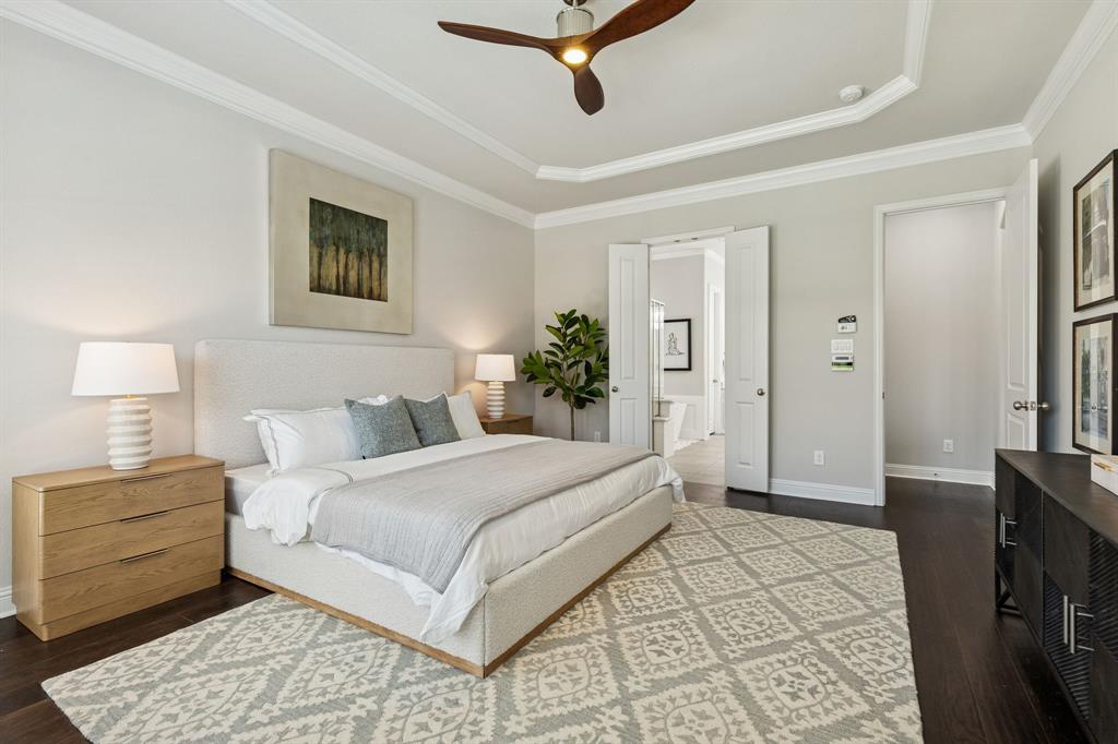 2816 Mona Vale Road Trophy Club, TX 76262 - Photo 14 of 40 a bedroom with a bed and a lamp on the dresser