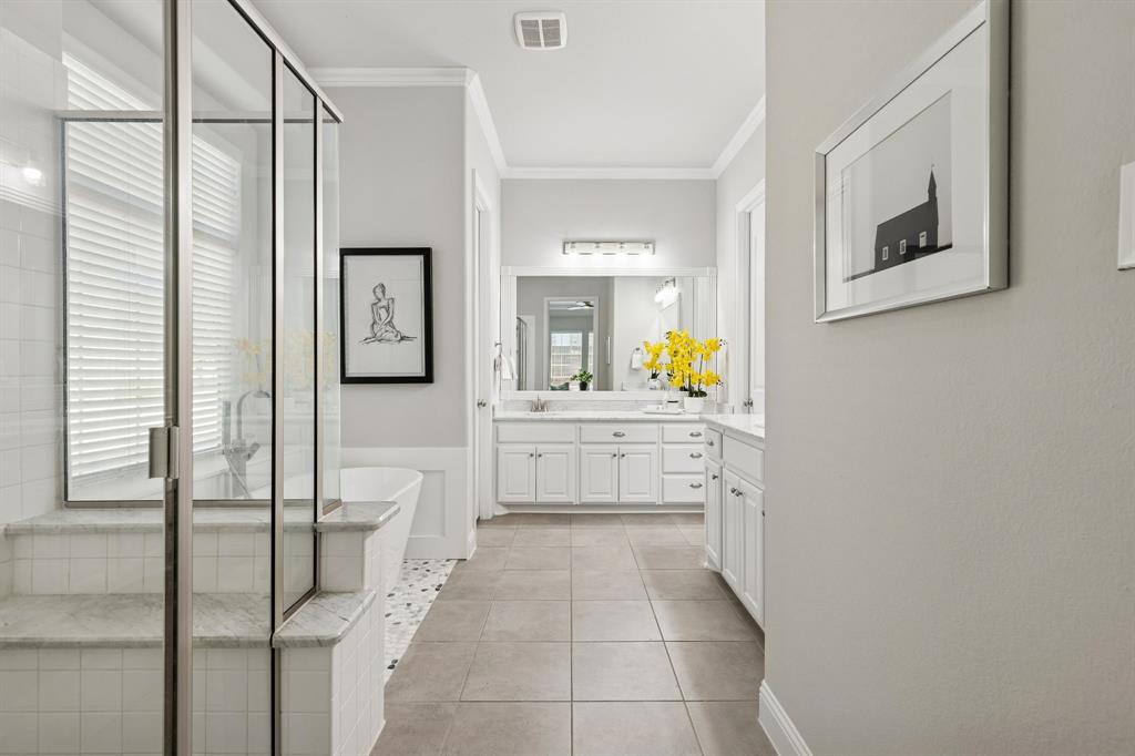 2816 Mona Vale Road Trophy Club, TX 76262 - Photo 15 of 40 a bathroom with a sink a vanity and mirror