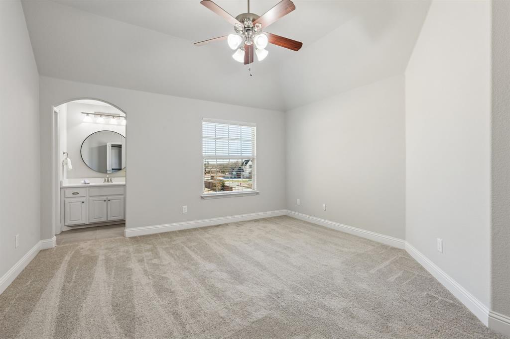 2816 Mona Vale Road Trophy Club, TX 76262 - Photo 30 of 40 an empty room with windows and fan