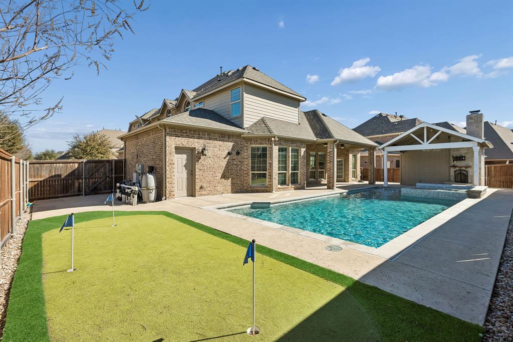 2816 Mona Vale Road Trophy Club, TX 76262 - Photo 33 of 40 a view of outdoor space yard and swimming pool
