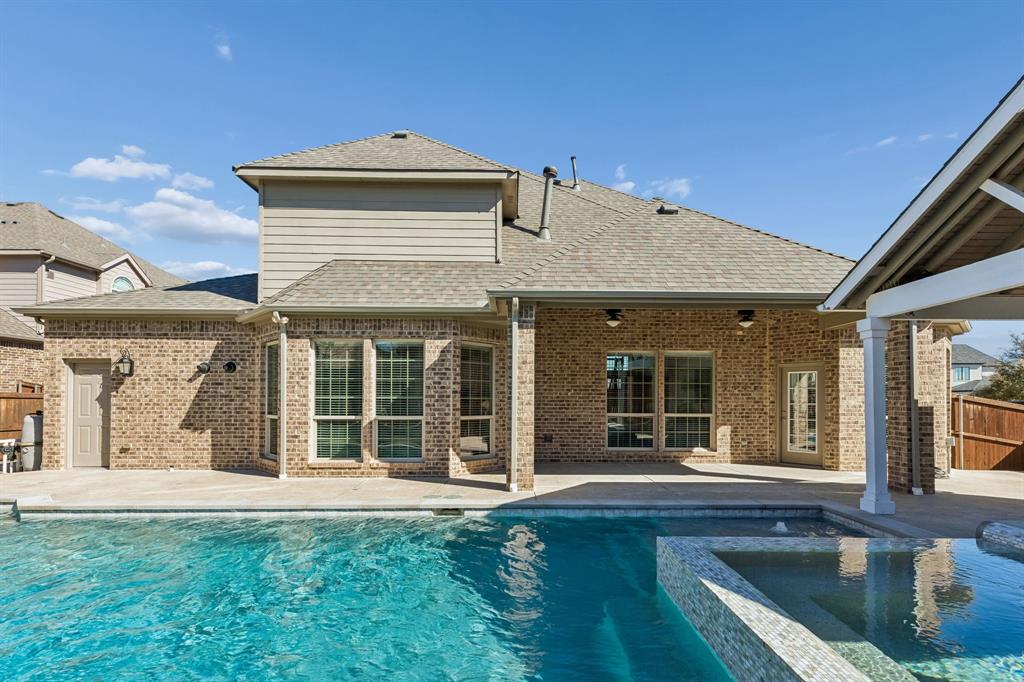 2816 Mona Vale Road Trophy Club, TX 76262 - Photo 34 of 40 a front view of a house with a yard