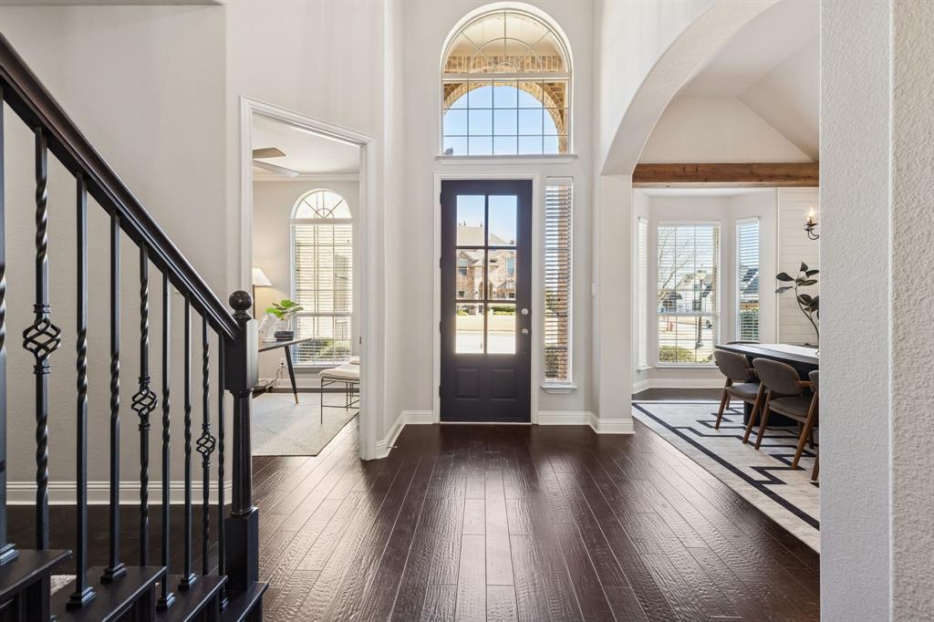 2816 Mona Vale Road Trophy Club, TX 76262 - Photo 4 of 40 a view of a livingroom with wooden floor and furniture