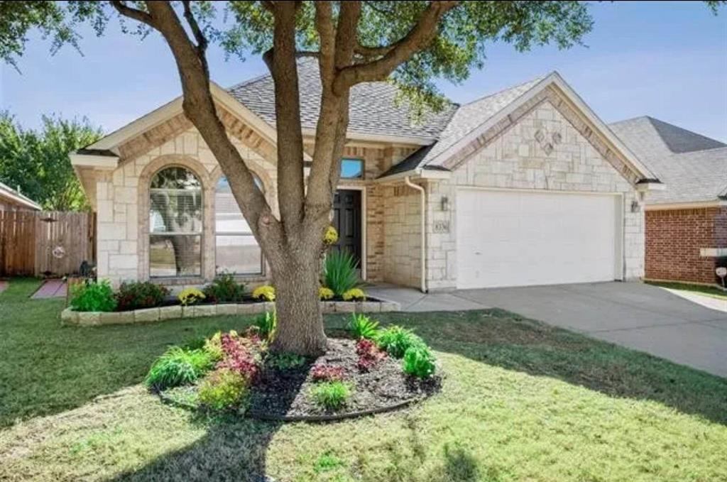8336 Trinity Vista Trail Fort Worth, TX 76053 - Photo 1 of 1 a front view of a house with a garden and plants