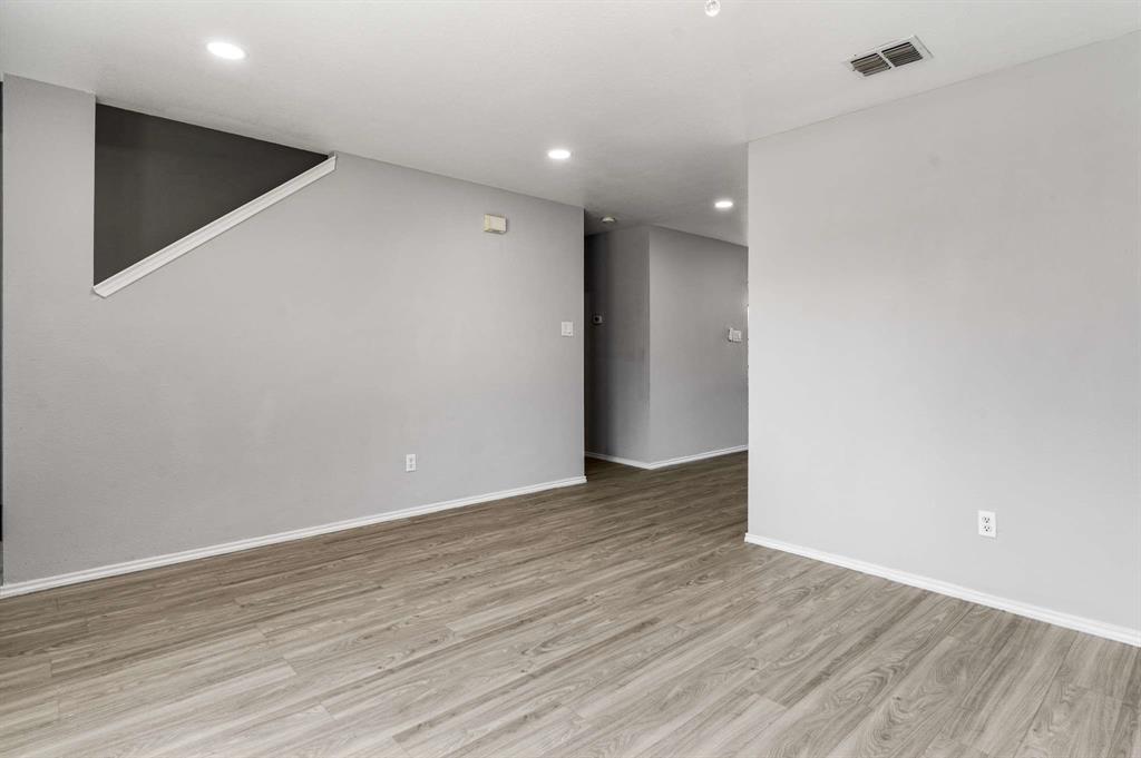 4529 Martingale View Lane Fort Worth, TX 76244 - Photo 17 of 38 a view of an empty room with wooden floor