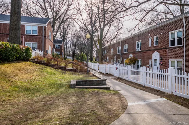 a view of a house with snow on the wall