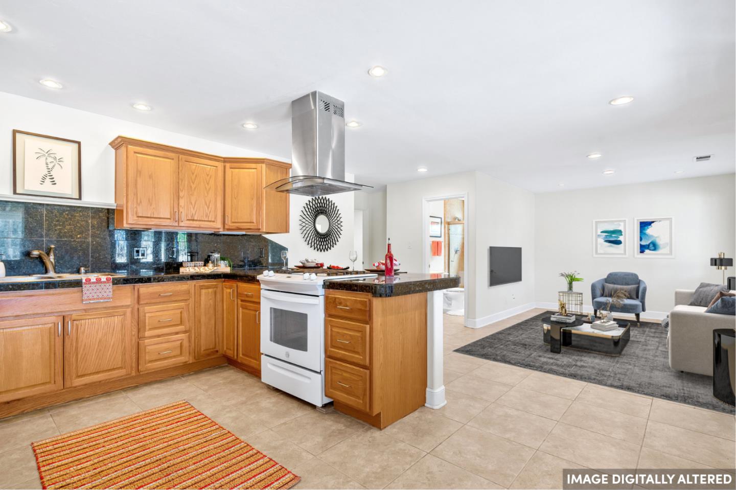 3373 Allred Lane Soquel, CA 95073 - Photo 20 of 31 a kitchen with stainless steel appliances granite countertop a sink a stove and a wooden floors