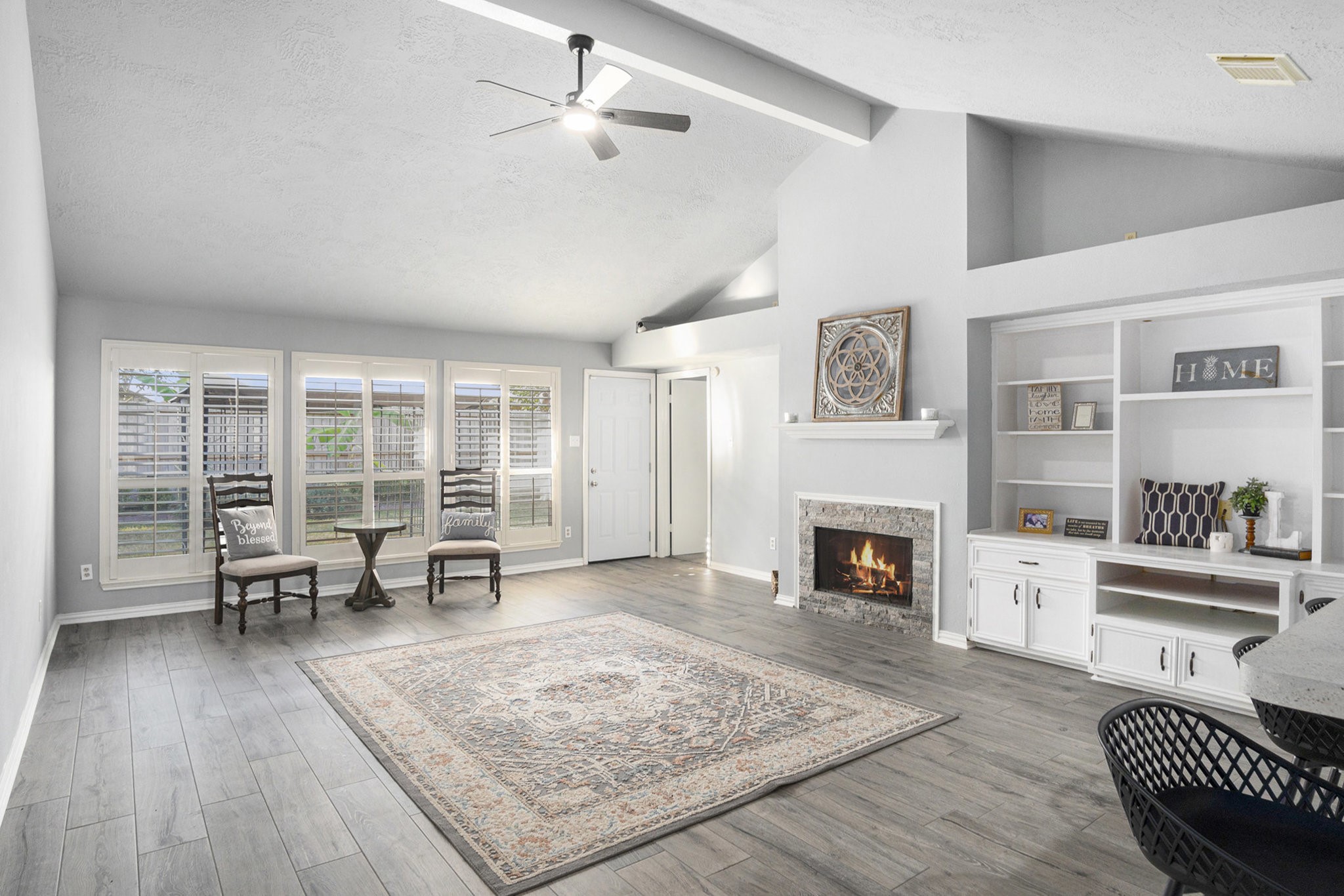 3315 Mourning Dove Drive Spring, TX 77388 - Photo 23 of 44 a living room with furniture and a fireplace
