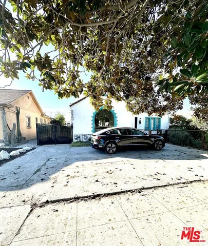 a view of a yard covered with snow