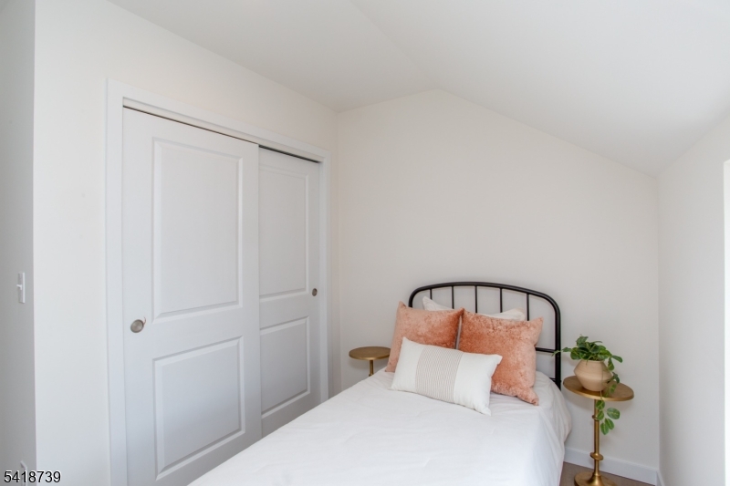 1434 Liberty Street Alpha, NJ 08865 - Photo 20 of 30 a bedroom with a bed and a window