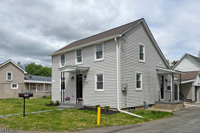 1434 Liberty Street Alpha, NJ 08865 - Photo 28 of 30 a front view of a house with a yard