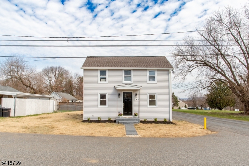 1434 Liberty Street Alpha, NJ 08865 - Photo 30 of 30 a front view of a house with a yard and garage