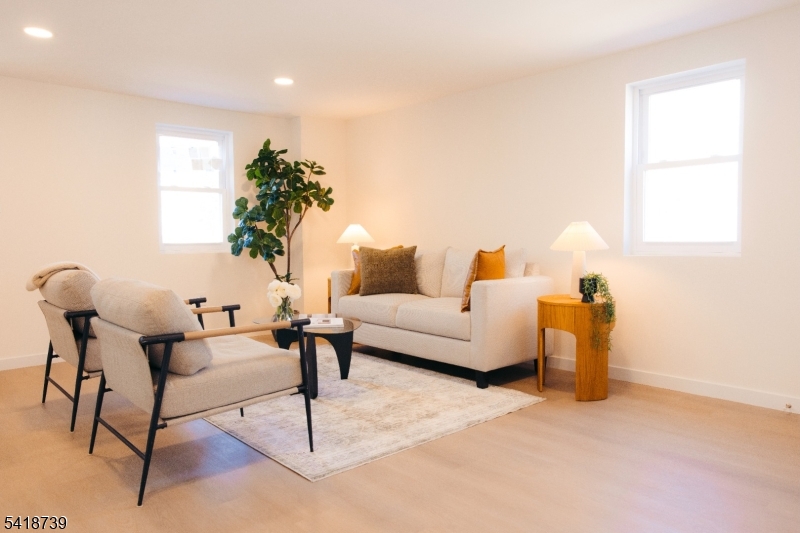 1434 Liberty Street Alpha, NJ 08865 - Photo 6 of 30 a living room with furniture and a potted plant