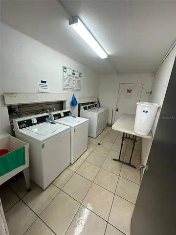 a utility room with washer and dryer