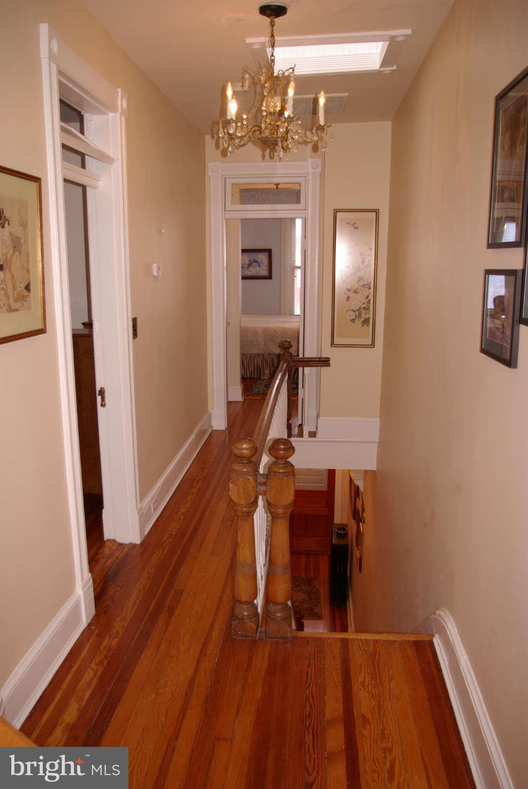 643 F Street Northeast Washington, DC 20002 - Photo 14 of 30 Upper hallway w skylt and pristine original floors