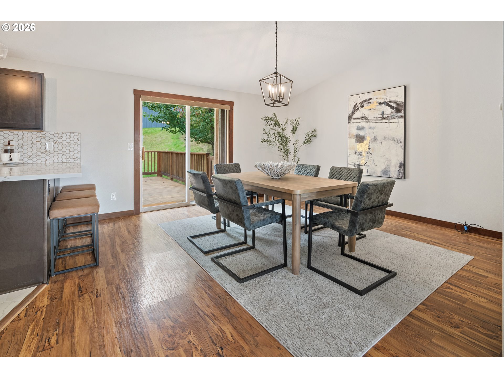 650 Marvin Road Tillamook, OR 97141 - Photo 13 of 48 a view of a dining room with furniture window and wooden floor