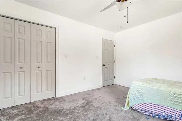 a bathroom with a sink a toilet and bathtub
