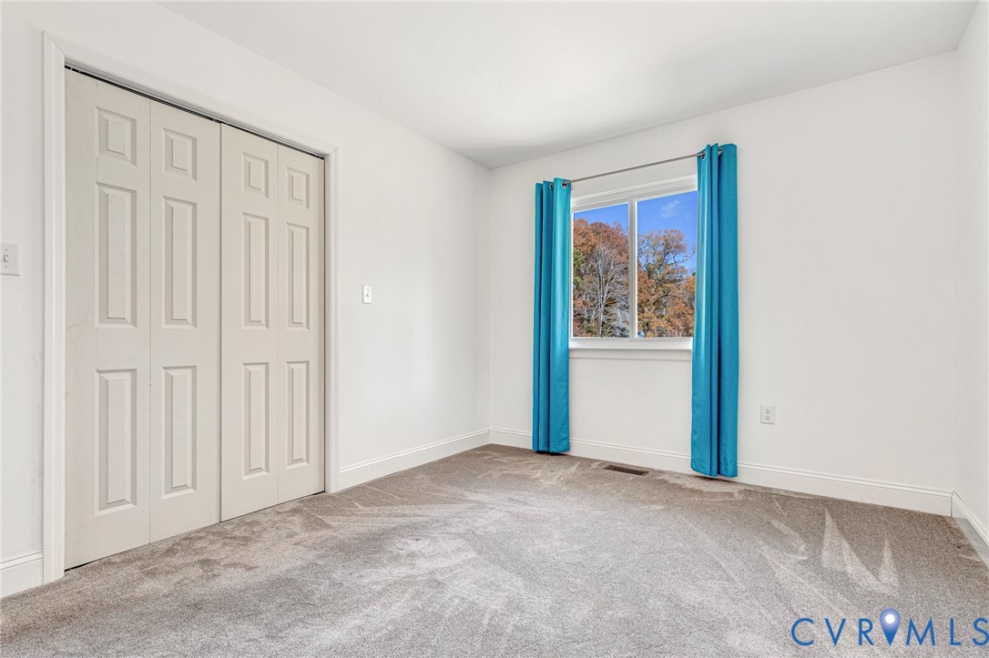 16307 Mountain Road Montpelier, VA 23192 - Photo 31 of 50 a view of an empty room with windows