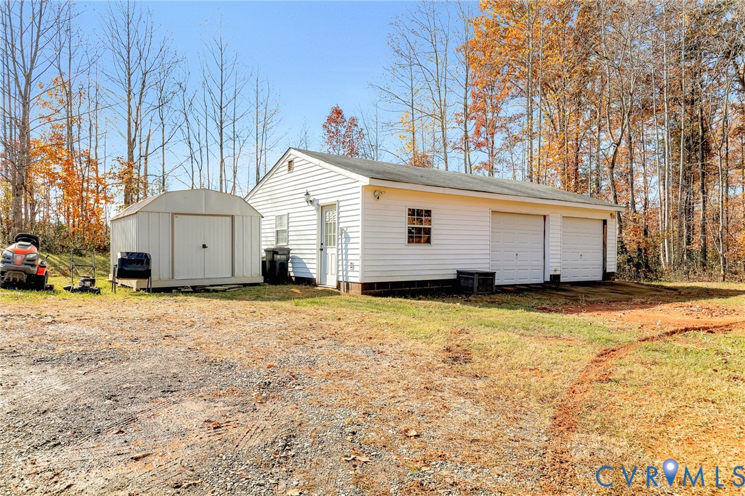 16307 Mountain Road Montpelier, VA 23192 - Photo 37 of 50 a view of a house with a yard