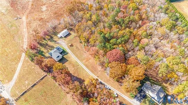 a picture of flowers with wooden floor