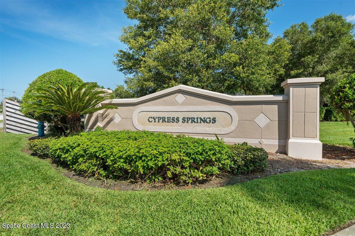 110 Colibri Way, Unit 107 Melbourne, FL 32901 - Photo 2 of 27 a sign on the side of a road