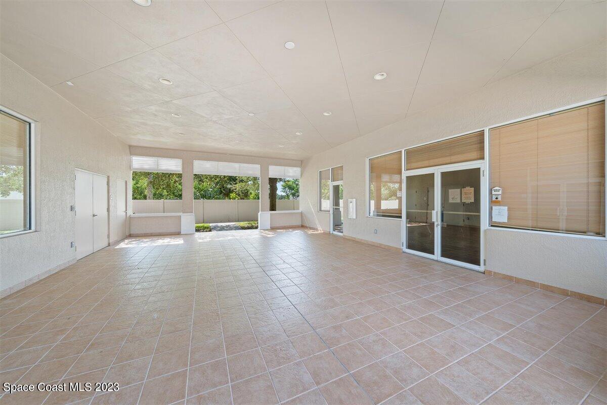 110 Colibri Way, Unit 107 Melbourne, FL 32901 - Photo 27 of 27 a view of an empty room with a window