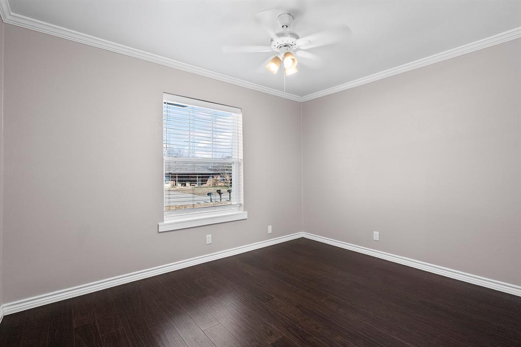 1135 Reed Circle Howe, TX 75459 - Photo 19 of 28 an empty room with wooden floor and window