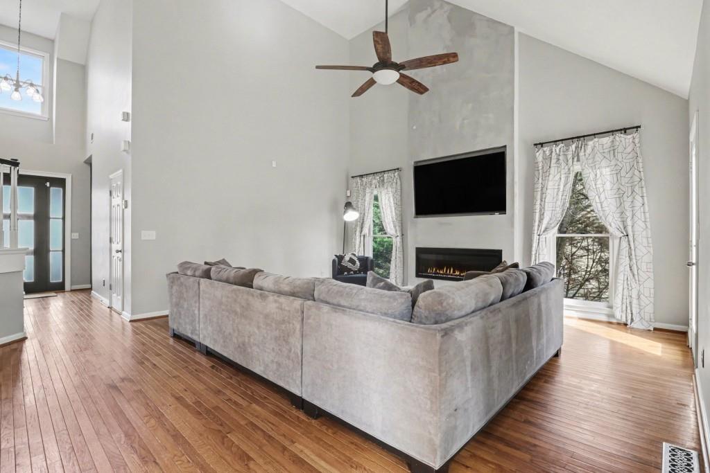 3793 Market Crescent Clarkston, GA 30021 - Photo 11 of 35 a living room with furniture and a flat screen tv