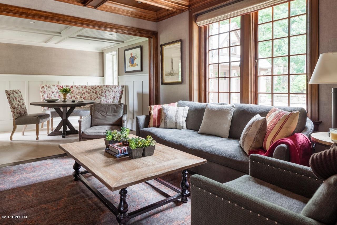 47 Carriglea Drive Riverside, CT 06878 - Photo 11 of 49 a living room with furniture and a large window