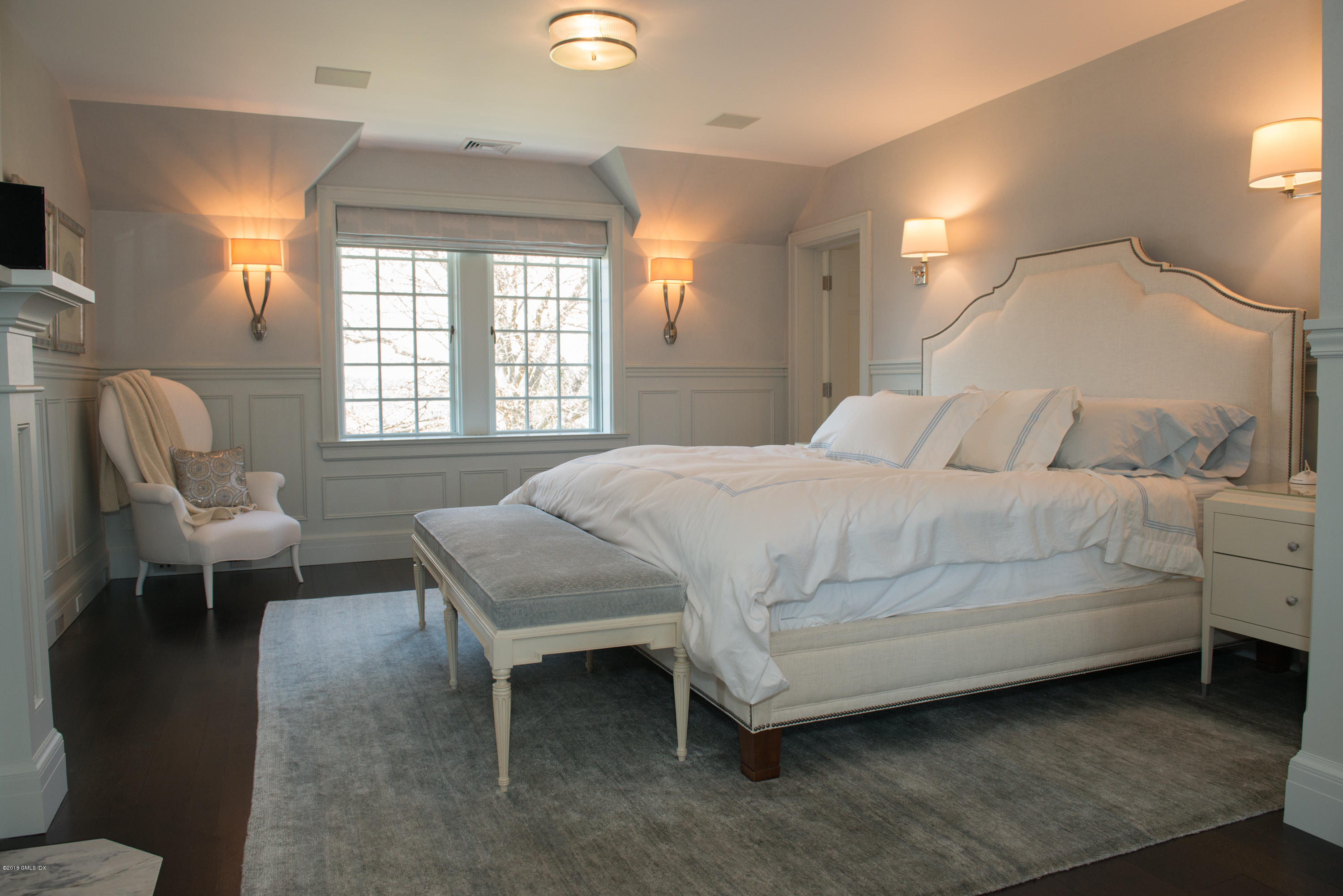 47 Carriglea Drive Riverside, CT 06878 - Photo 14 of 49 a bedroom with a bed chair and window