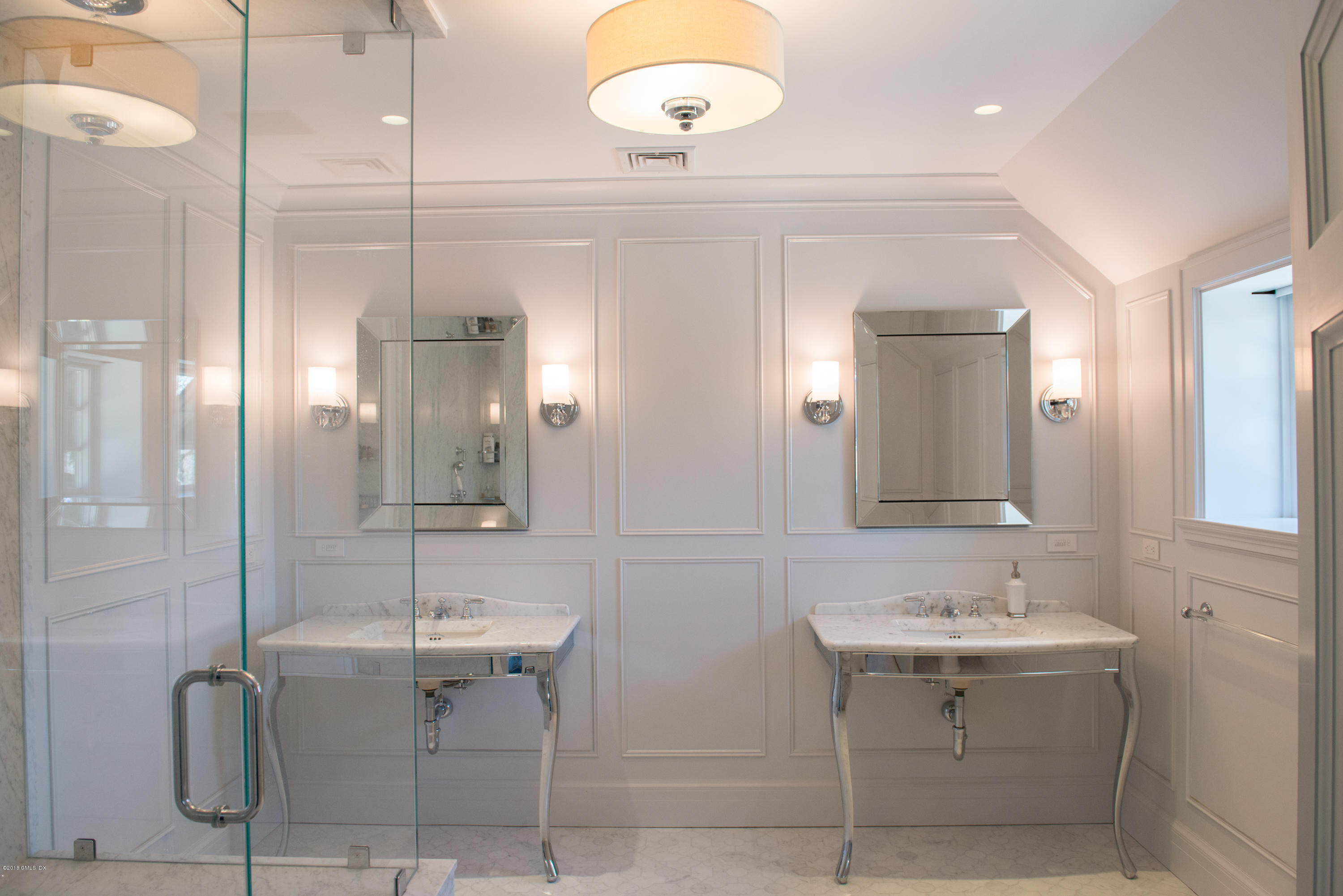 47 Carriglea Drive Riverside, CT 06878 - Photo 15 of 49 a bathroom with a sink and mirror