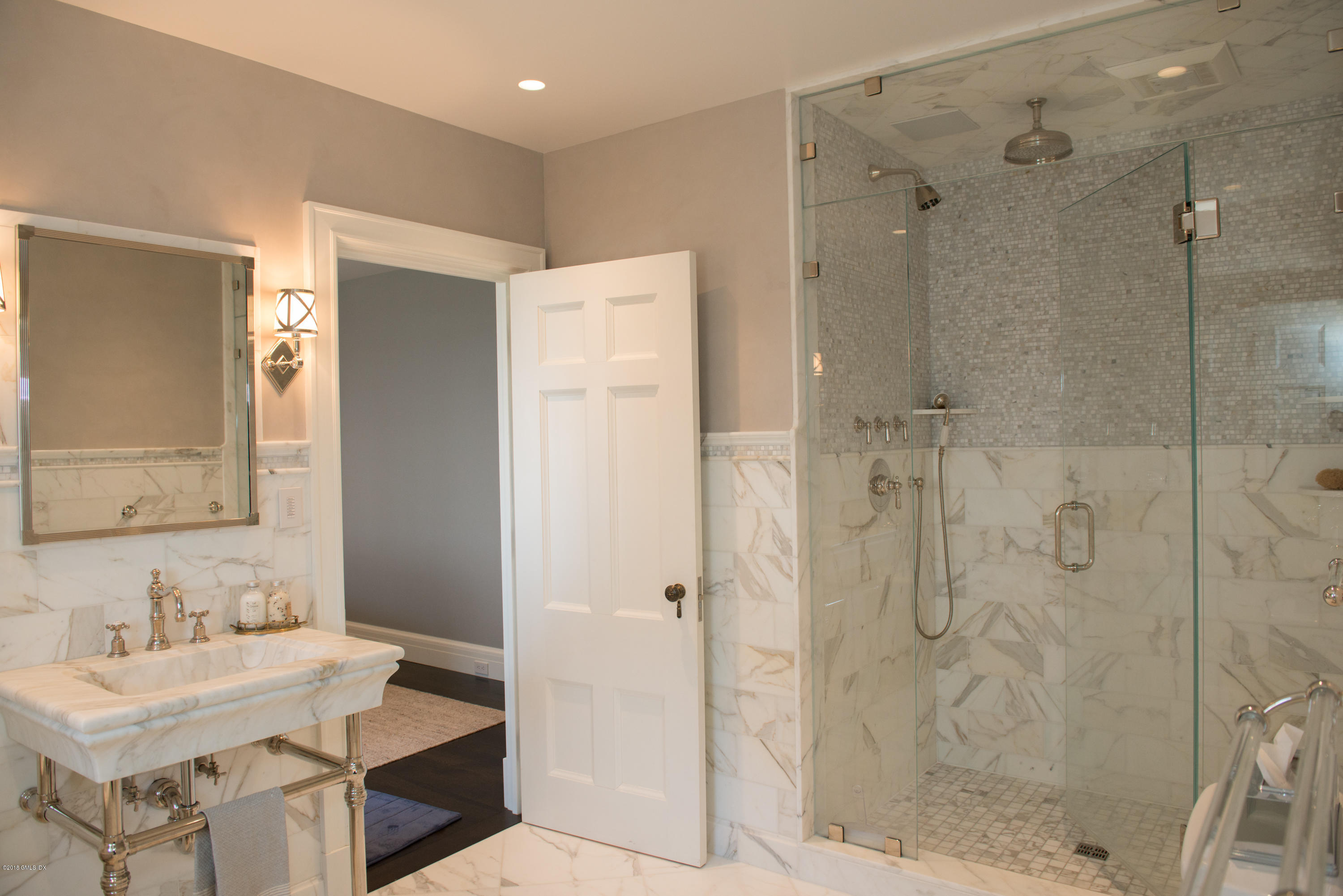 47 Carriglea Drive Riverside, CT 06878 - Photo 17 of 49 a bathroom with a sink shower and a mirror