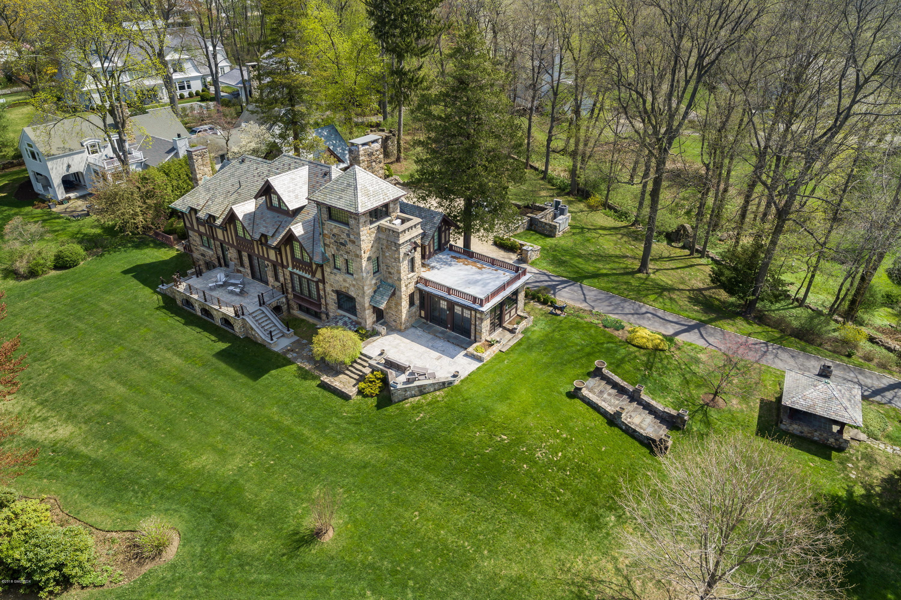 47 Carriglea Drive Riverside, CT 06878 - Photo 2 of 49 an aerial view of a house with a garden