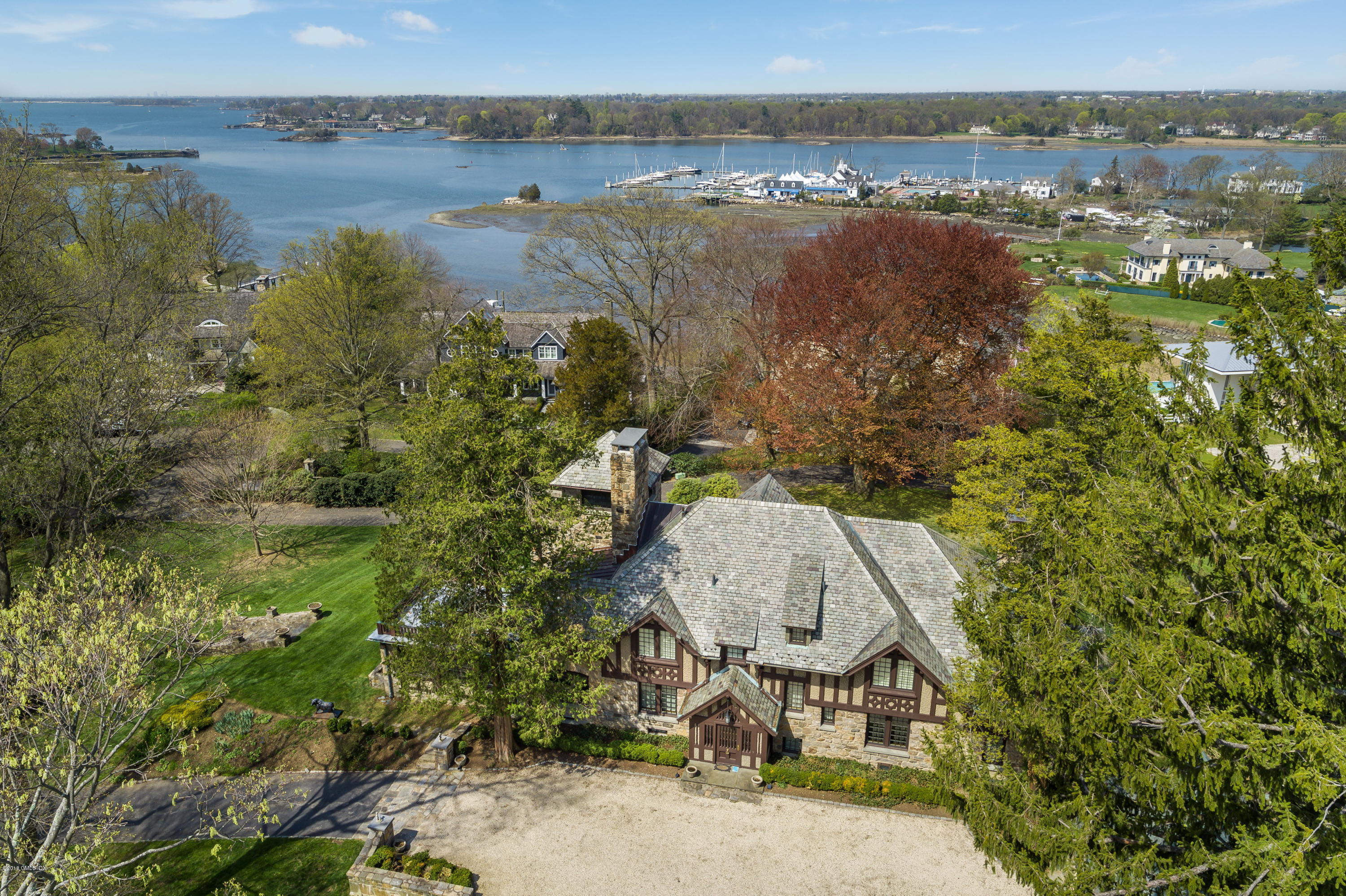 47 Carriglea Drive Riverside, CT 06878 - Photo 3 of 49 an aerial view of a house with a lake view