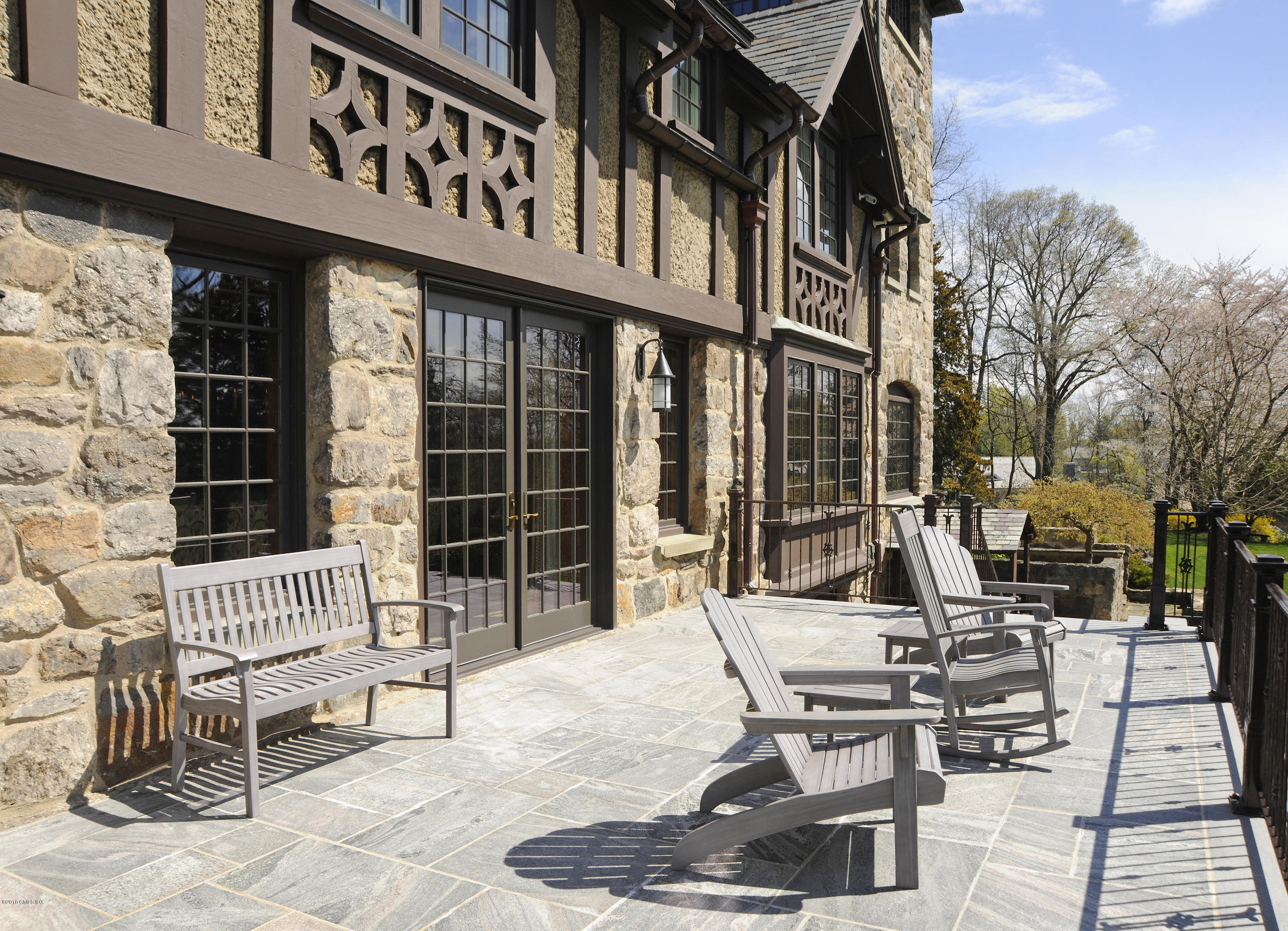 47 Carriglea Drive Riverside, CT 06878 - Photo 36 of 49 a view of a chairs and table in a patio