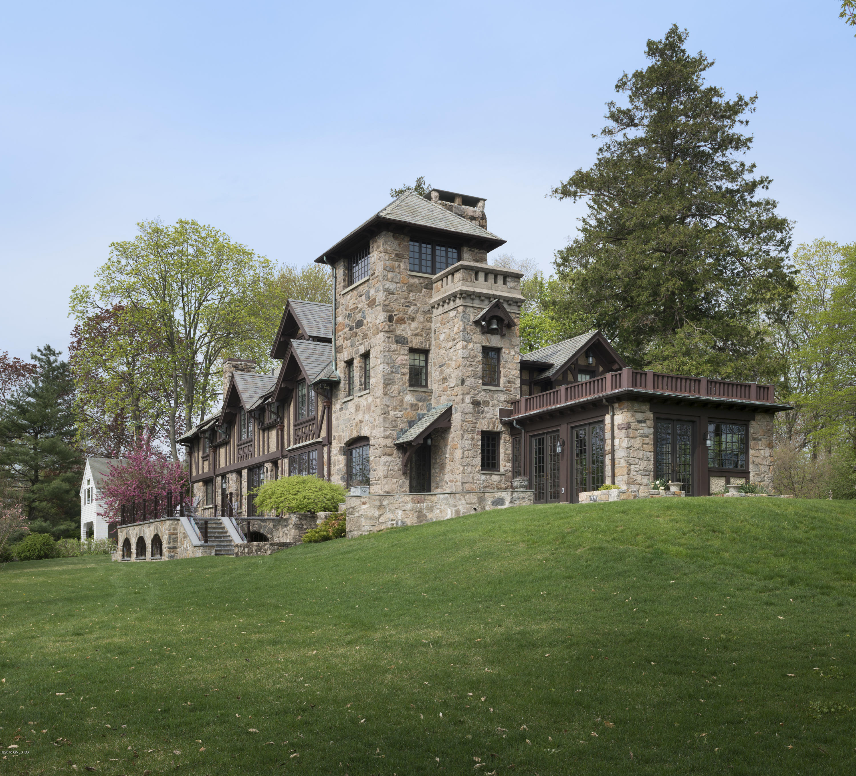 47 Carriglea Drive Riverside, CT 06878 - Photo 41 of 49 a view of a house with a yard and sitting area