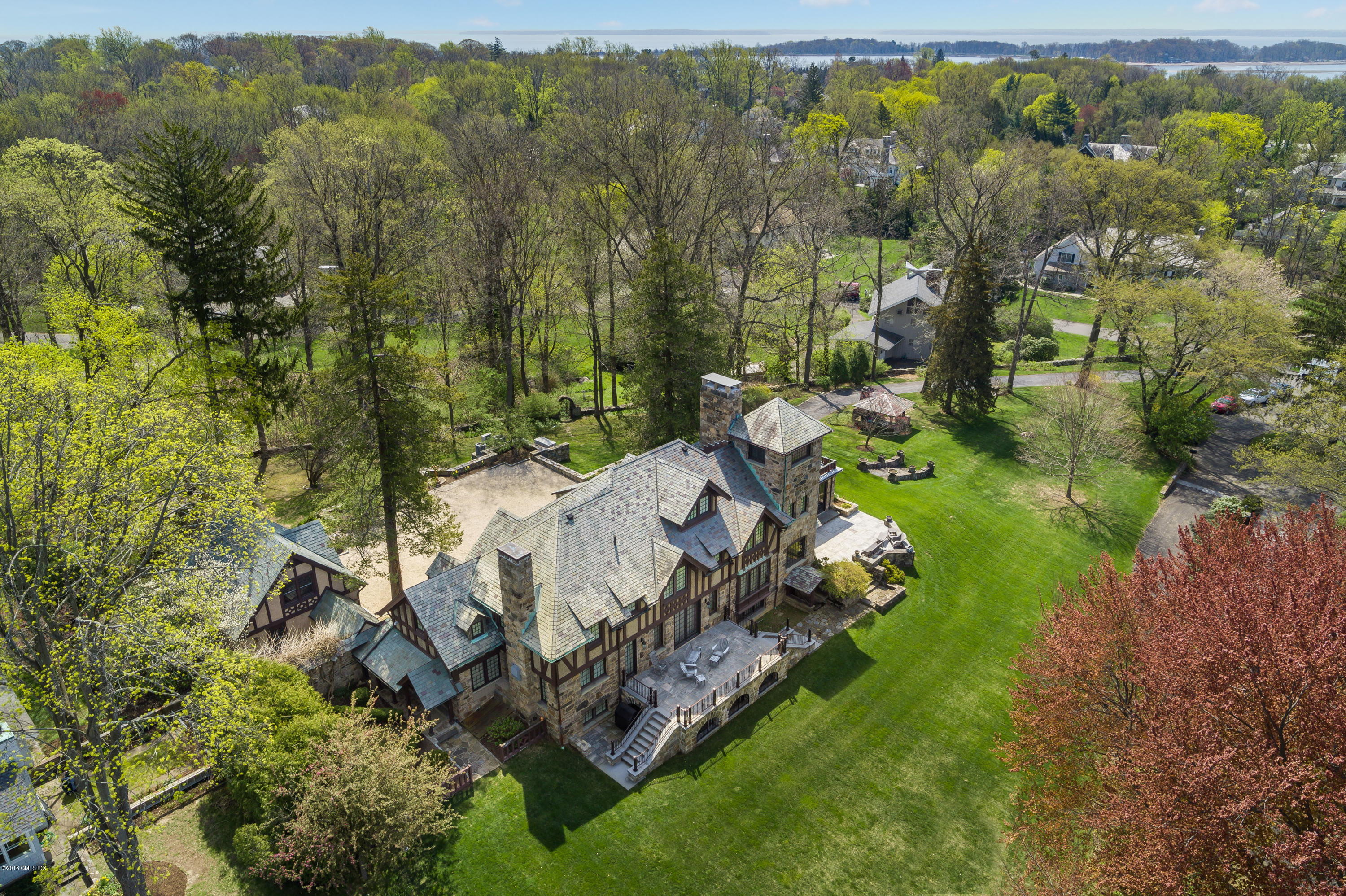 47 Carriglea Drive Riverside, CT 06878 - Photo 47 of 49 a view of a forest with a house