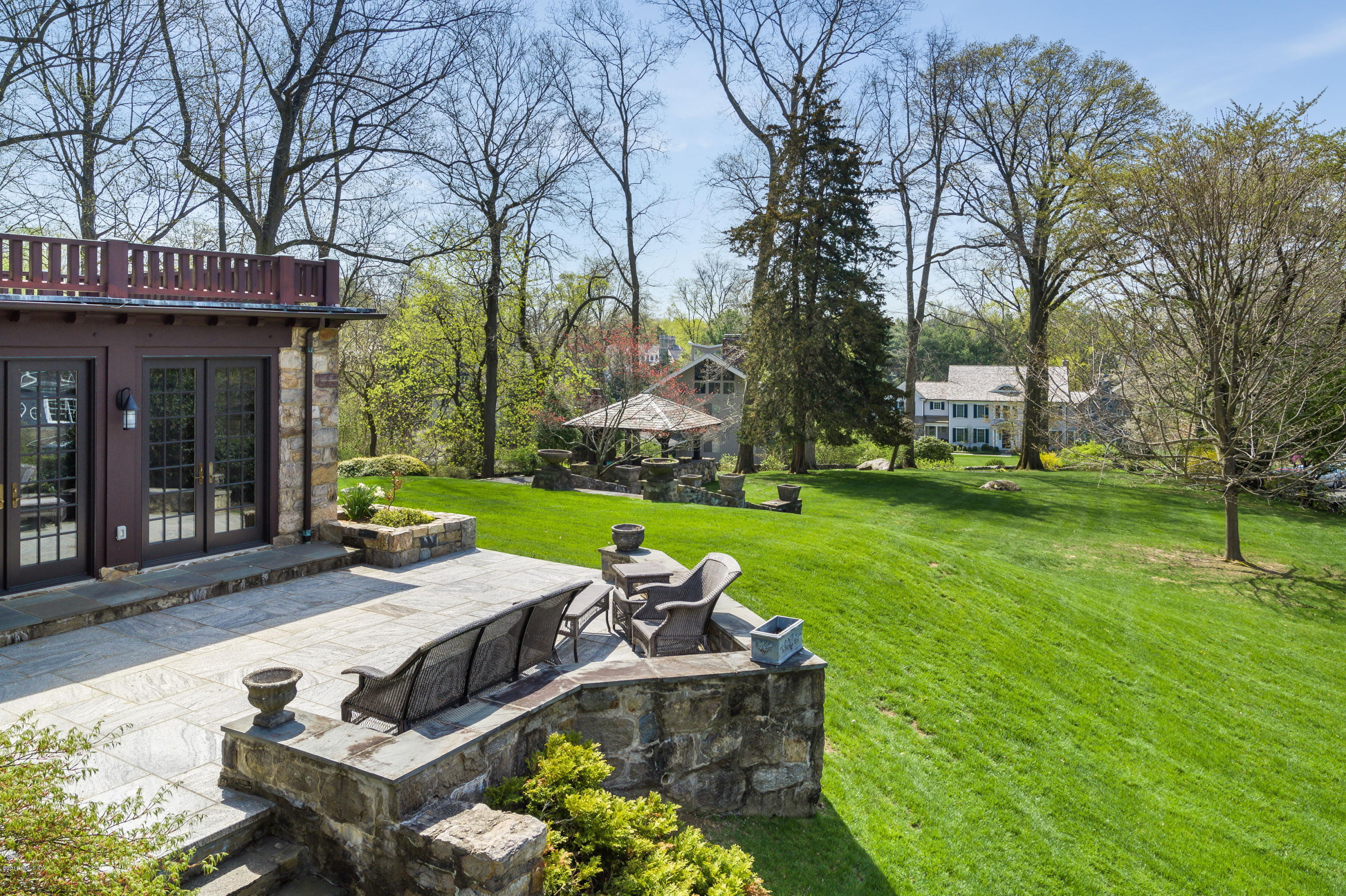 47 Carriglea Drive Riverside, CT 06878 - Photo 7 of 49 a view of a house with garden and sitting area