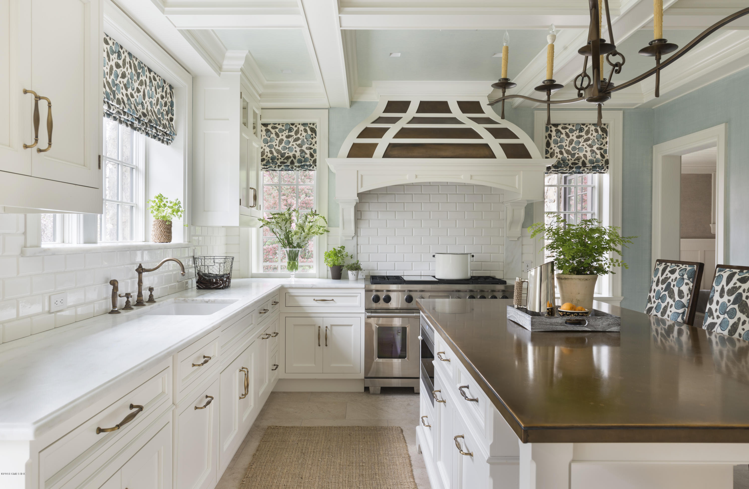 47 Carriglea Drive Riverside, CT 06878 - Photo 9 of 49 a kitchen with stainless steel appliances a sink stove and cabinets