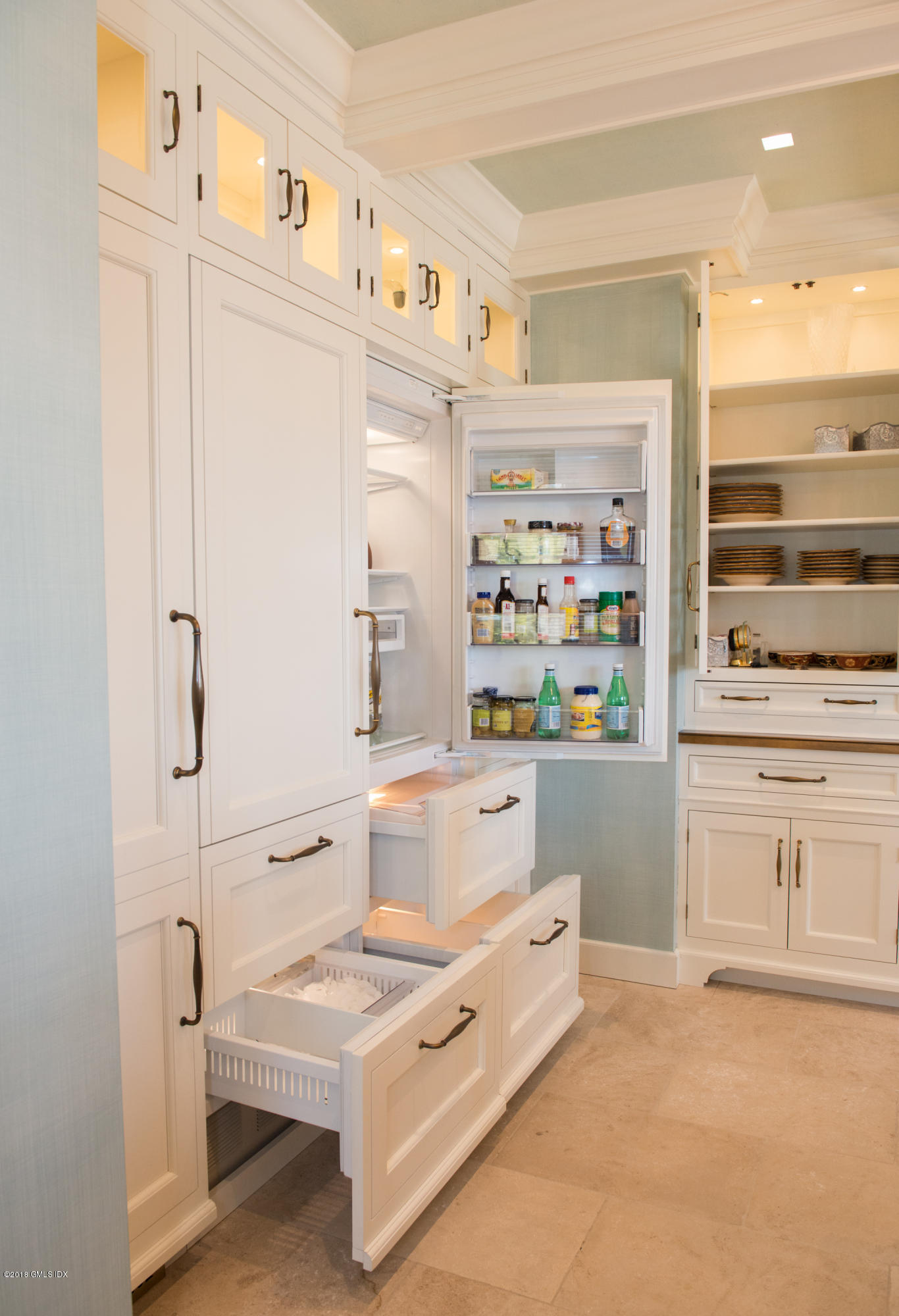 47 Carriglea Drive Riverside, CT 06878 - Photo 10 of 49 a kitchen with white cabinets and white appliances