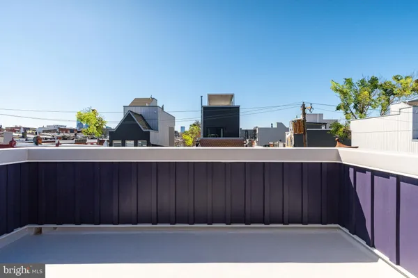 a view of a balcony with door