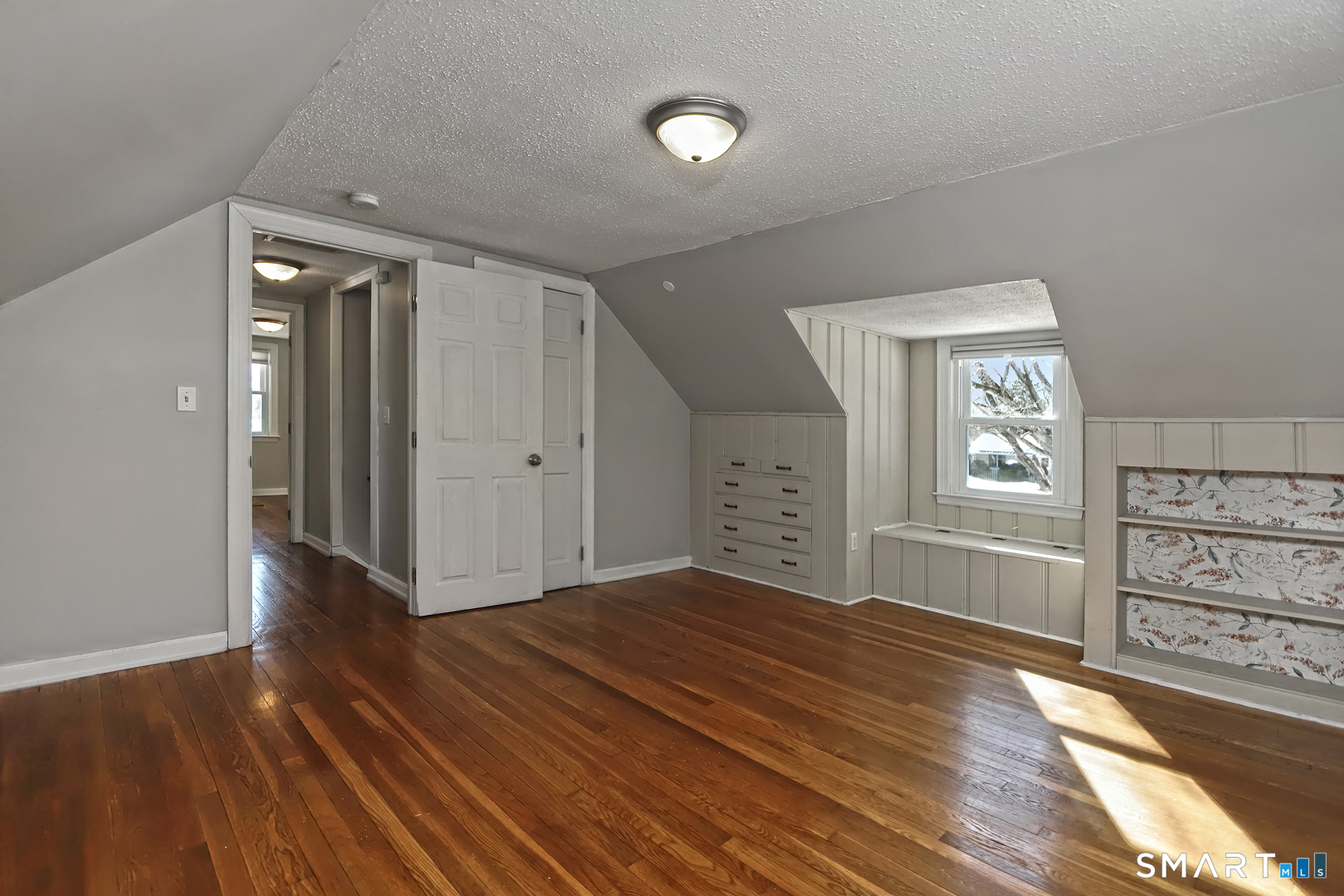 10 Hemingway Road North Haven, CT 06473 - Photo 22 of 38 2nd floor BR Hardwood floors and built-in storage