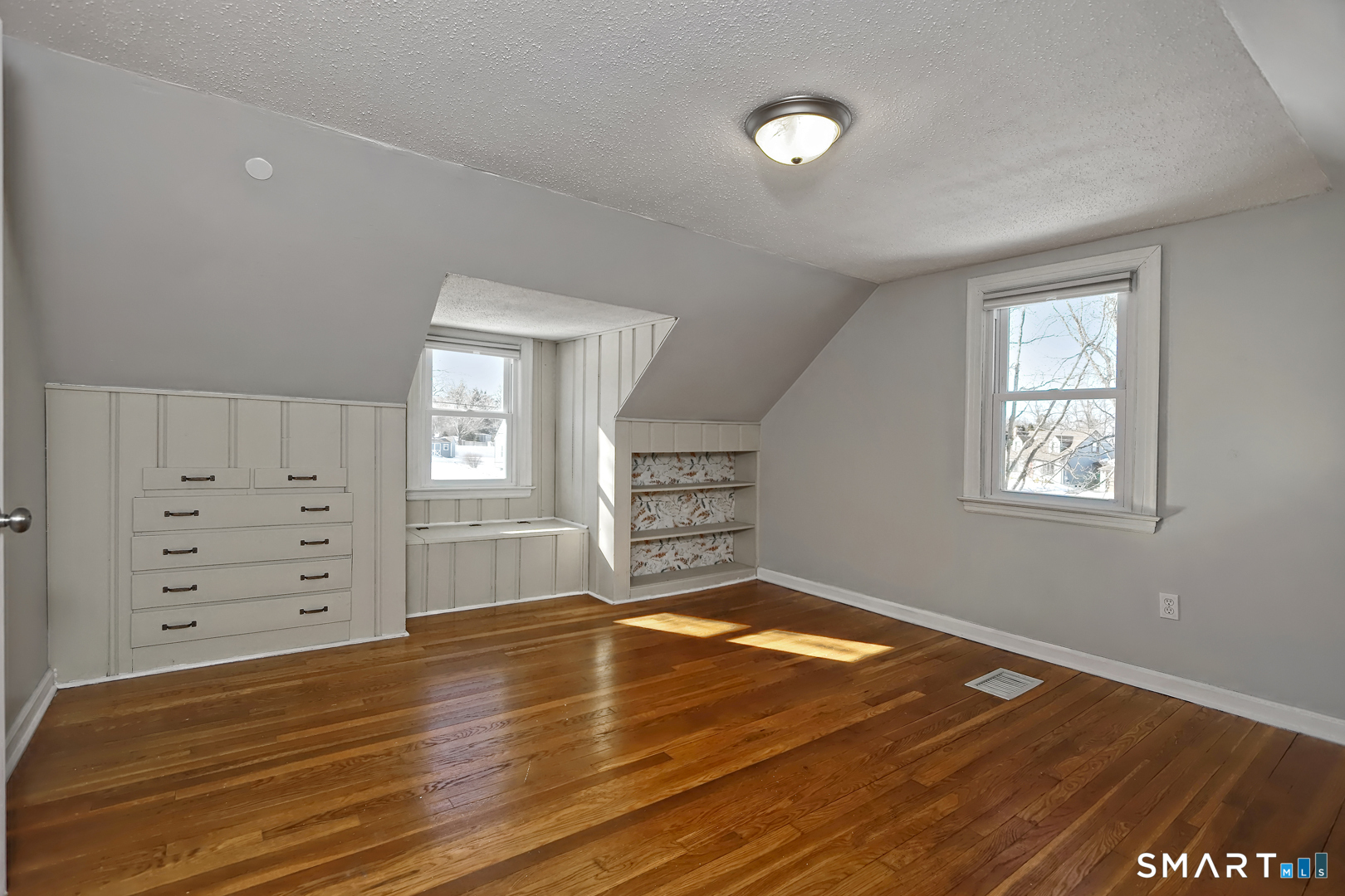 10 Hemingway Road North Haven, CT 06473 - Photo 23 of 38 2nd floor BR Hardwood floors and built-in storage