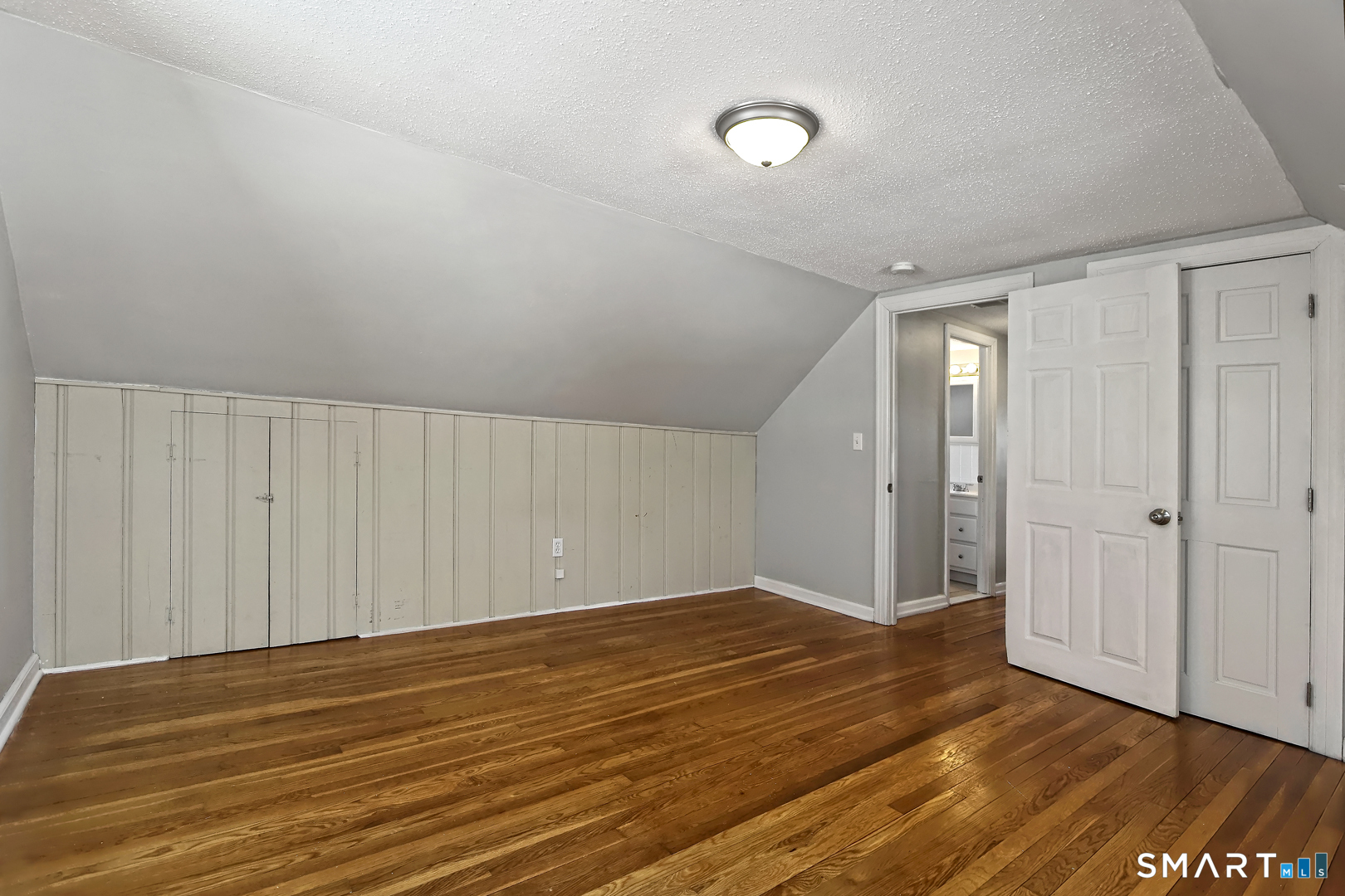 10 Hemingway Road North Haven, CT 06473 - Photo 24 of 38 2nd floor BR with storage in eaves, closet space and built-ins