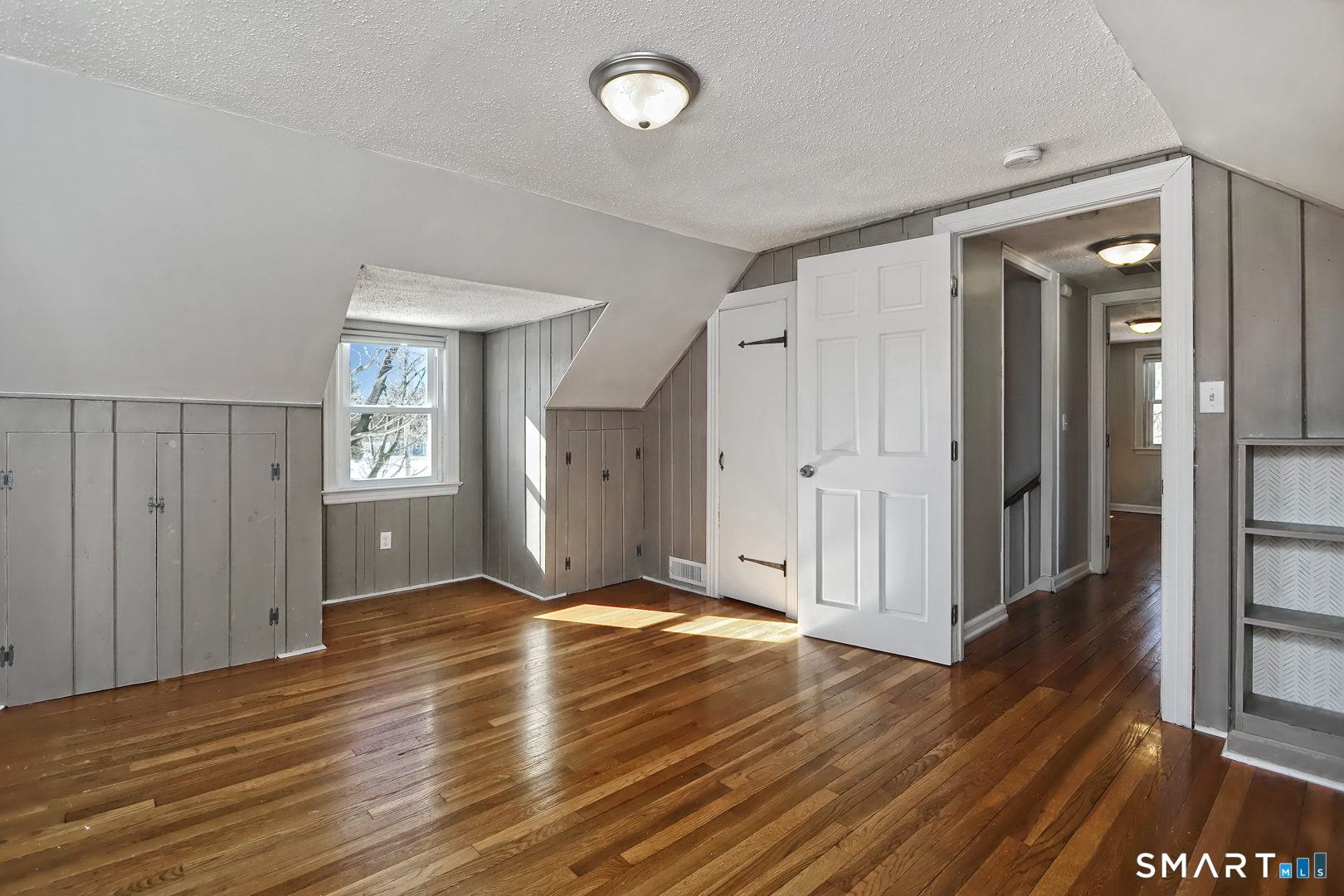 10 Hemingway Road North Haven, CT 06473 - Photo 26 of 38 2nd floor BR Hardwood floors and built-in storage plus closet space