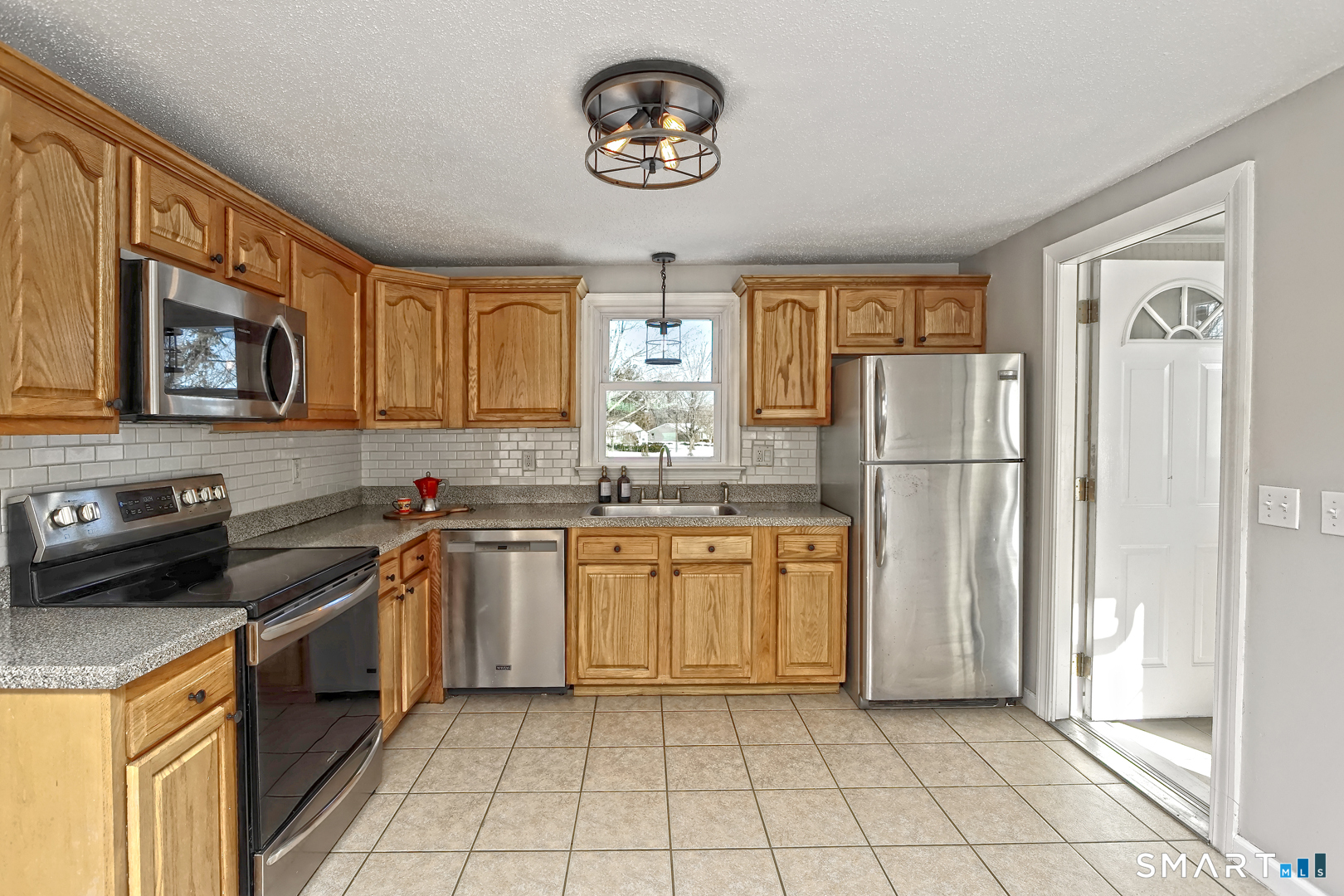 10 Hemingway Road North Haven, CT 06473 - Photo 4 of 38 Kitchen has entry from driveway and mudroom